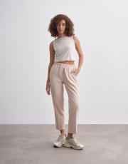 beli lastikli pantolon bej